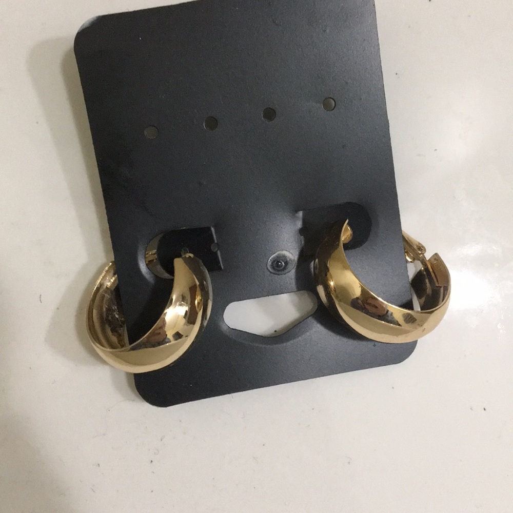 Never worn hoop earrings